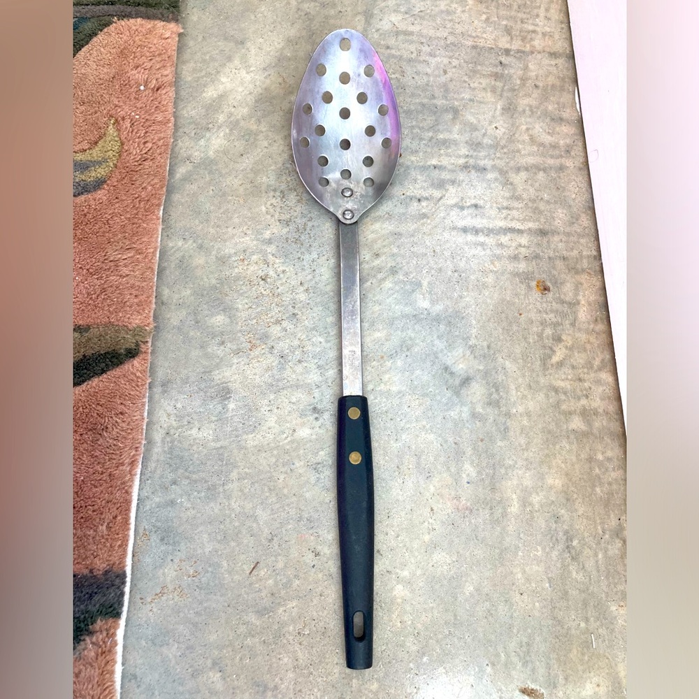 1940s vintage Stainless Steel Slotted Spoon with Black Handle